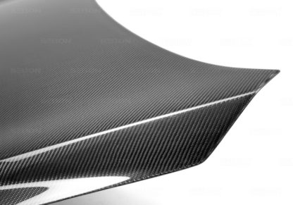 Seibon 09-10 Kia Forte OEM-Style Carbon Fiber Hood - Image 3