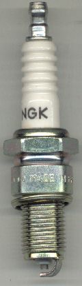 An NGK spark plug; the fine iridium tip on the ILKAR8H6 is why a wire-type gap tool is worth using instead of a flat feeler gauge